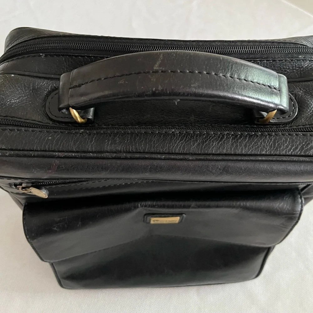 Vintage 70’s Luciano black Italian leather messenger bag.